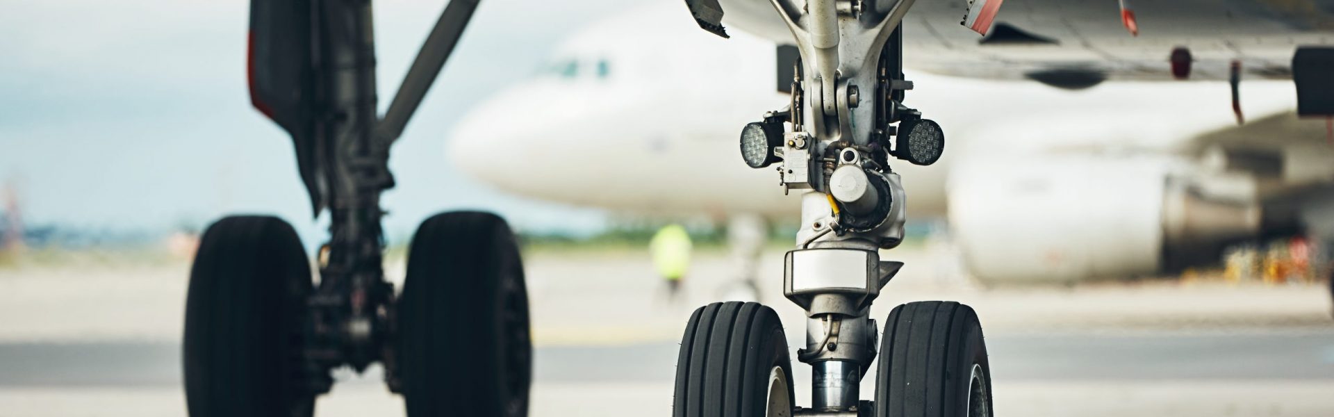 Chassis of the airplane. Plane taxiing from the runway to the gate.
